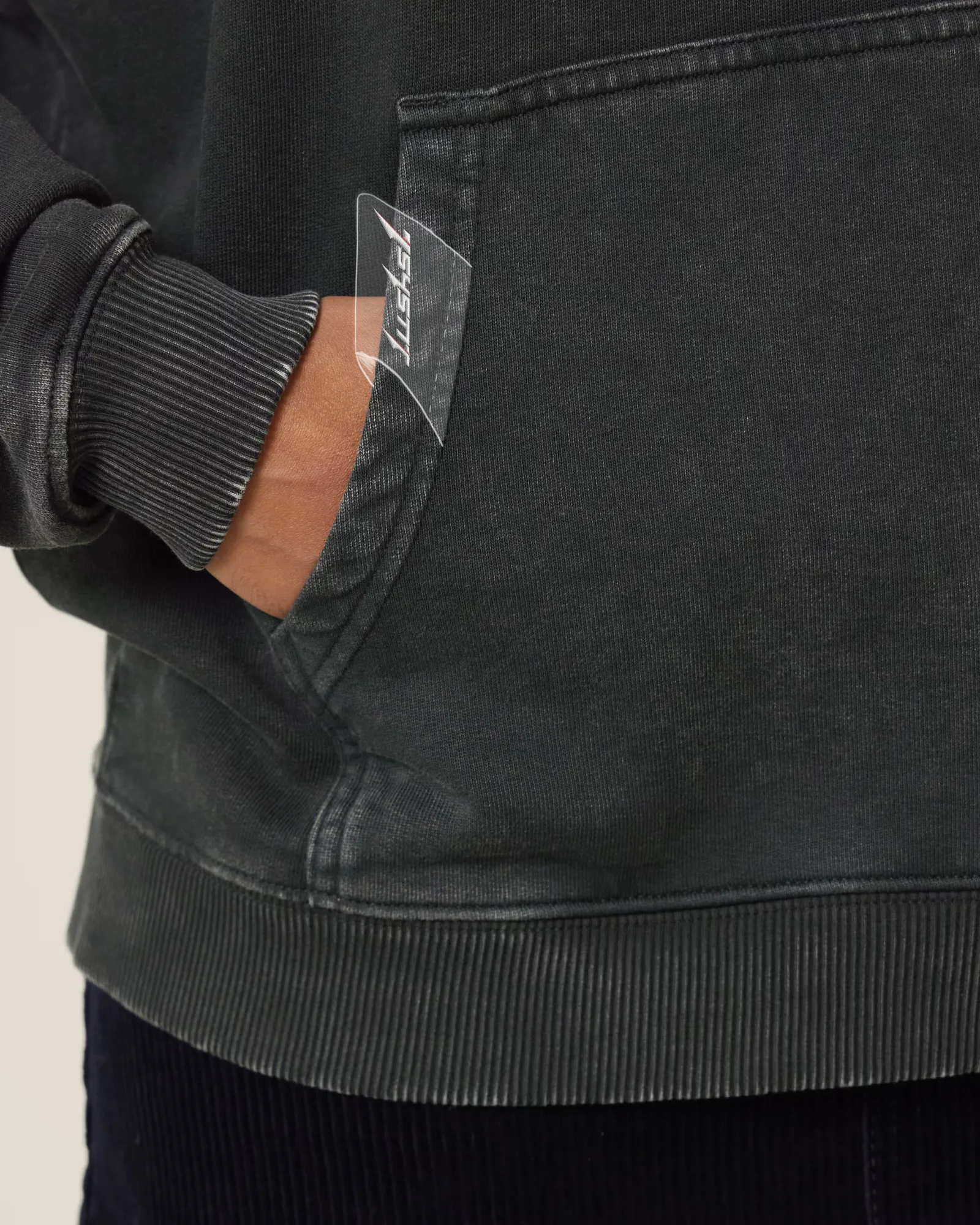 Transparent label on the hoodie pocket